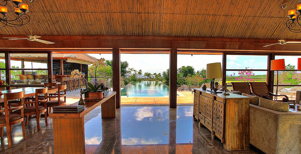 Indah Manis - Living and dining view across the pool